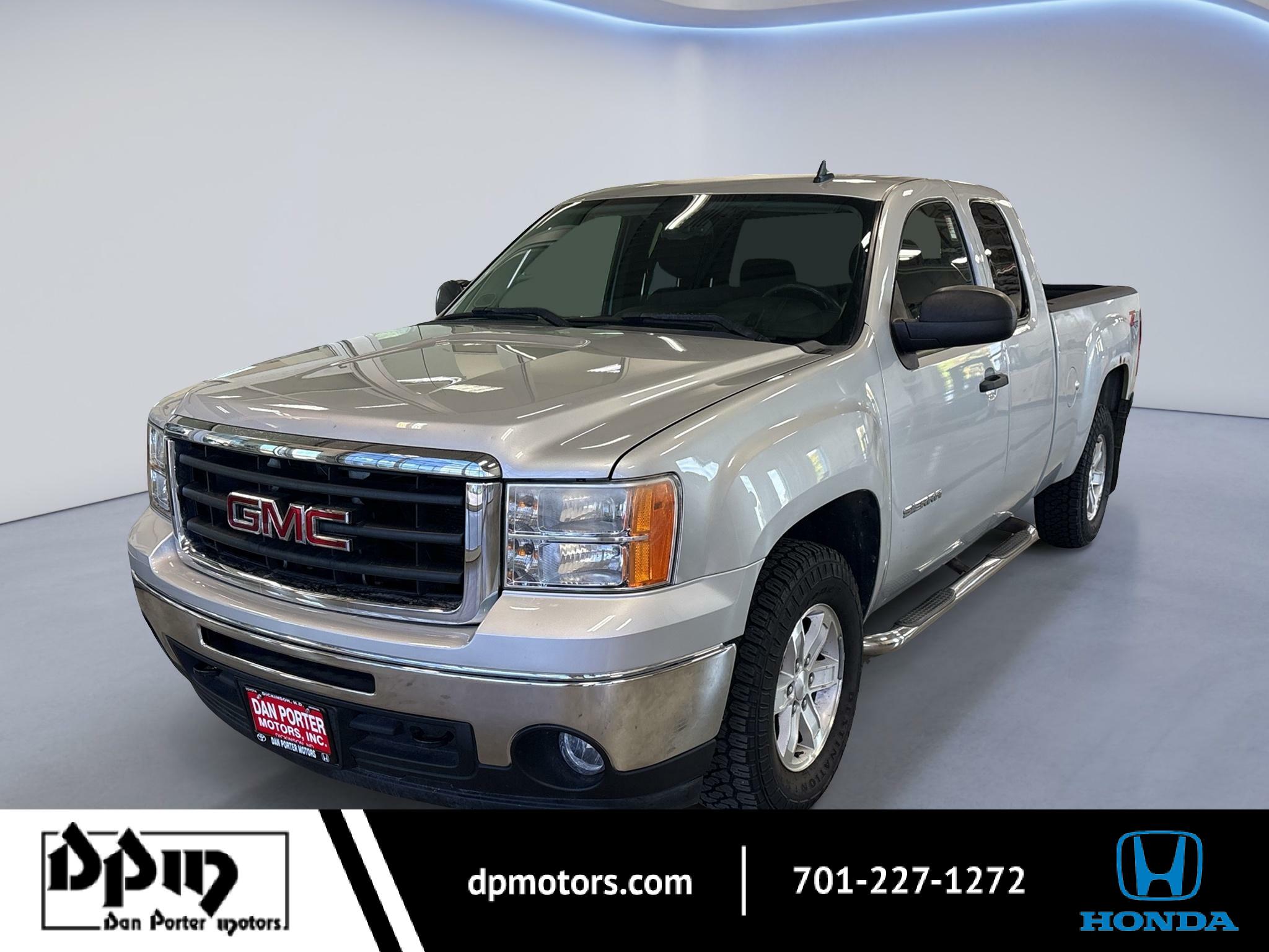 Pure Silver Metallic 2011 GMC Sierra 1500 Pickup Truck Four-Wheel Drive 4-Speed Automatic